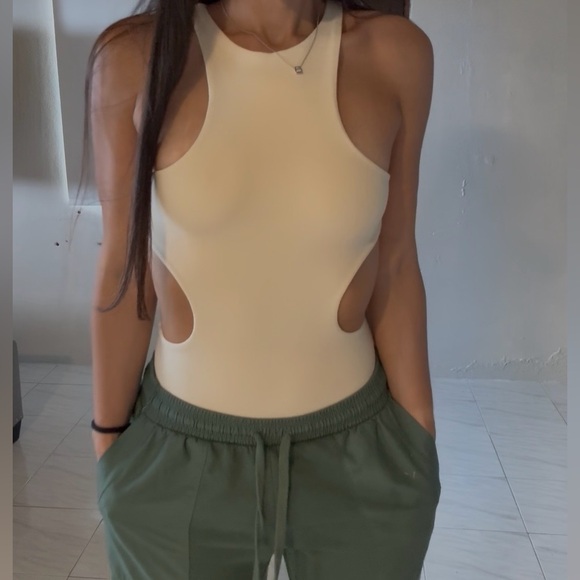 Zara Tops - Zara Cream Cutout One-Piece Bodysuit